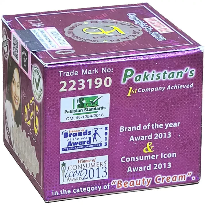 Box of Pakistan's Beauty Cream with awards and branding details on a purple background