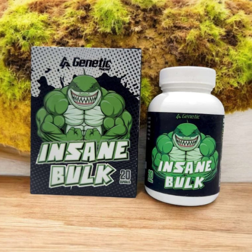 Insane Bulk supplement packaging with a muscular green character on a wooden surface with mossy background