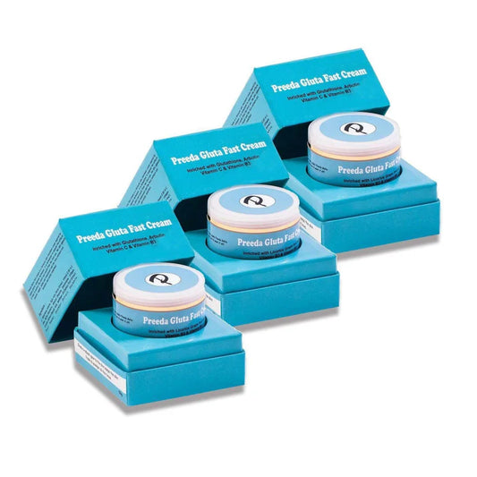 Multiple jars of Freeda Gluta Face Cream with blue packaging on a white background