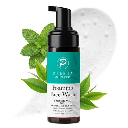 Preeda Foaming Face Wash bottle with green leaves on a white background